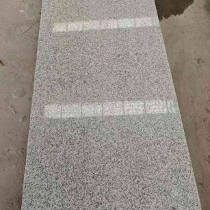 海南芝麻白光面毛板