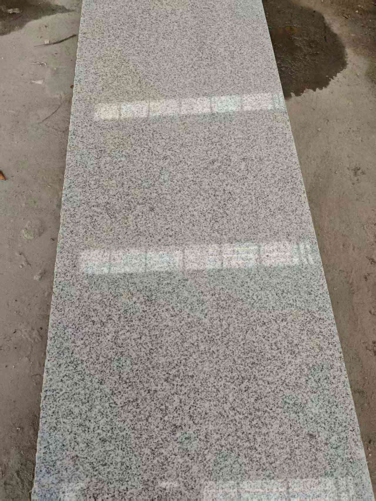 海南芝麻白光面毛板